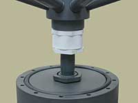 Close-up view of SWT's PVC reducer bushing in DS assembly